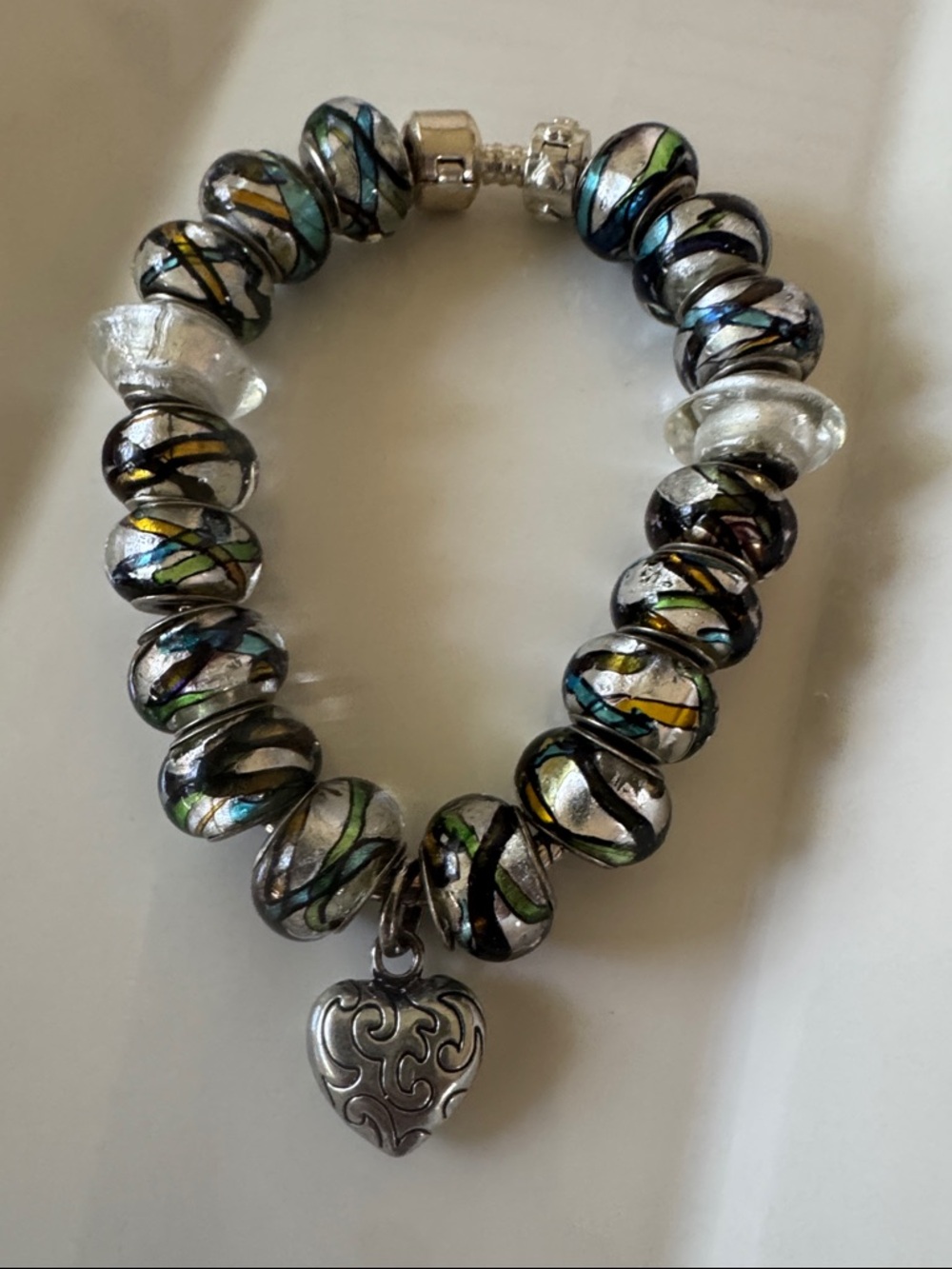 Artisan style Multicolor Glass Bead Bracelet with Silver Heart. (Troll??)